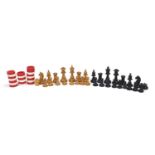 Turned wooden chess set and a set of draughts :For Further Condition Reports Please Visit Our