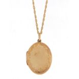 Oval 9ct gold locket on a 9ct gold necklace, the locket 3.5cm in length, 8.6g :For Further Condition