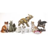 Decorative animals including a bronzed Pegasus, dragon, dogs and elephant :For Further Condition