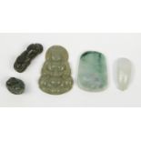 Five Chinese jade pendants, including one carved with a Buddha, the largest 5cm high :For Further