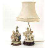 Capodimonte figural table lamp with shade and figure group, the largest overall 55cm high :For