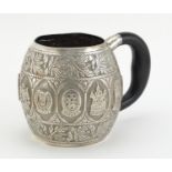 Malaysian silver tankard with horn handle (possibly rhinoceros horn), embossed with crests,