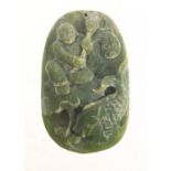 Chinese jade pendant carved with a figure and fish, 7cm high :For Further Condition Reports Please