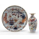 Chinese porcelain vase and shallow dish hand painted in the Imari palette, the largest 22cm in