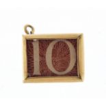 9ct gold emergency ten shilling note charm, 1.4cm wide, 2.7g :For Further Condition Reports Please
