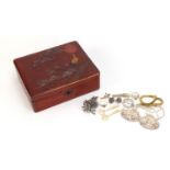 Mostly silver and white metal costume jewellery housed in a Chinese lacquered box including a