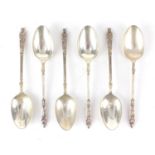 Set of six unmarked silver teaspoons with figural terminals, each 11.5cm in length, 58.6g :For