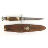 Military interest Commando knife with bone handle, the leather sheaf with Royal Sussex Regiment