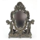 Ornate spelter cartouche mirror supported by two Putti, 47cm high :For Further Condition Reports