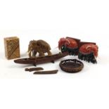 Wooden objects including a Maori boat, Japanese puzzle box and hand painted elephant bookends :For