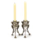 Pair of silver plated faun design candlesticks, indistinct impressed to the feet, each candlestick