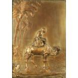 Coppered relief panel of an Egytian figure on camel back, framed, 38cm x 26cm :For Further Condition
