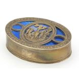 German silver and enamel snuff box, the hinged lid pierced and embossed with Putti and gilt