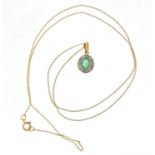 9ct gold emerald and diamond pendant on a 9ct gold necklace, the pendant 1.5cm in length, 1.0g :