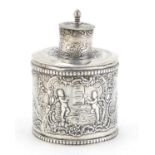 Victorian cylindrical silver caddy embossed with Putti, by Edwin Thompson Bryant, London import