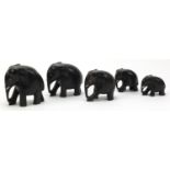 Graduated set of five carved ebony elephants, the largest 10.5cm high :For Further Condition Reports