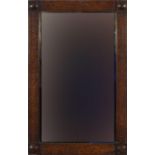 Arts & Crafts carved oak wall mirror with bevelled glass, 79cm x 51cm :For Further Condition Reports