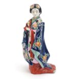 Japanese porcelain figure of a Geisha girl wearing a robe, 30cm high :For Further Condition