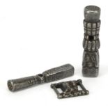 Tibetan iron including a desk seal and lion head buckle, the larger 4.8cm in length :For Further