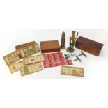 Collection of Victorian student microscopic glass slides and two brass microscopes :For Further