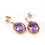 Pair of unmarked gold amethyst earrings, 3.2cm in length, 8.4g :For Further Condition Reports Please