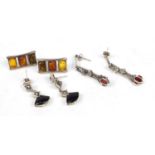 Three pairs of silver earrings including marcasite and amber examples :For Further Condition Reports