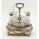 Victorian silver seven bottle cruet stand by Thomas Smily, with seven glass bottles, some with