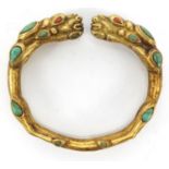 Tibetan gilt metal dragon bangle set with coral and turquoise, 7.5cm wide :For Further Condition