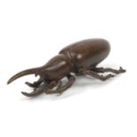 Japanese patinated bronze Hercules beetle, impressed marks to the base, 8cm in length :For Further