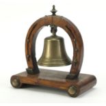 Oak and brass horseshoe design table bell, 22cm high :For Further Condition Reports Please Visit Our