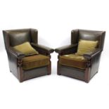 Pair of oak framed green leather wingback armchairs, 84cm high :For Further Condition Reports Please