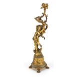 Classical gilt bronze Putti design candlestick raised on lion paw feet, 35.5cm high :For Further