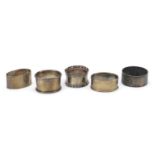 Five Victorian and later silver napkin rings, various hallmarks, 100.0g :For Further Condition