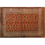 Afghan brown ground rug with all over geometric design, 190cm x 125cm :For Further Condition Reports