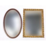 Rectangular gilt framed mirror and a mahogany framed oval mirror, both with bevelled glass, the
