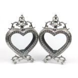 Pair of ornate silvered love heart design candle holders, each 46.5cm high :For Further Condition