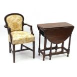 Oak drop-leaf table and open armchair with floral upholstery :For Further Condition Reports Please