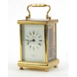 Large Angelus brass cased carriage clock with Roman and Arabic numerals, 14cm high :For Further