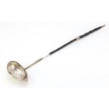 Georgian unmarked silver ladle with twisted horn handle, 40cm in length :For Further Condition