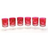 Set of six French cranberry glass liqueur glasses etched with wild game, 7.5cm high :For Further