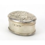 Early 19th century German silver box, the hinged lid embossed with a figure on horseback and