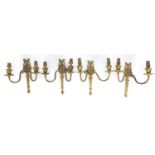 Set of four brass wall sconces with C scrolls and swags, each 23cm high :For Further Condition