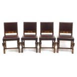 Set of four Arts & Crafts inlaid oak dining chairs by James Shoolbred & Co, with carved cup and