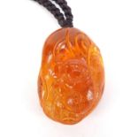 Chinese natural amber pendant carved with a squirrel, 4.5cm high :For Further Condition Reports