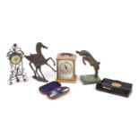 Sundry items including a Metamec mantel clock, bronzed model of Pegasus and a vanity set housed in a