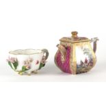 Meissen floral encrusted demitasse cup and a pink ground teapot hand painted with panels of