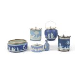 Wedgwood blue and white jasperware including three biscuit barrels with silver plated mounts, the