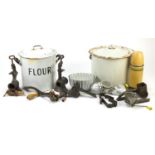 Vintage kitchenalia including two enamelled flour bins and covers, mincers and jelly moulds :For