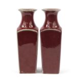 Pair of Chinese porcelain sang de bouef glazed porcelain vases, each 26cm high :For Further