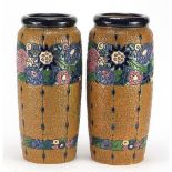 Large pair of Art Nouveau Czechoslovakian pottery vases by Amphora, enamelled with flowers, each